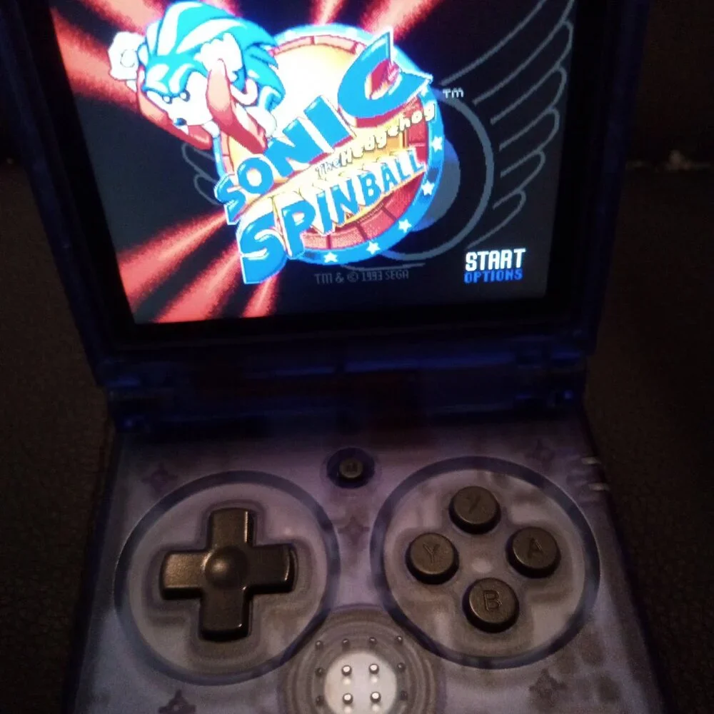 Pre-Loaded Anbernic RG35XXSP blue transparent with most retro platforms 64gb